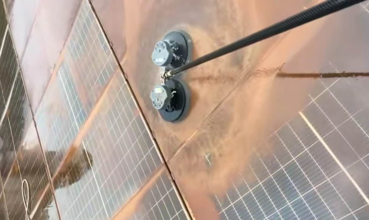 Solar panel cleaning at sunset